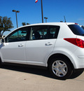 nissan versa 2011 white hatchback 1 8 s gasoline 4 cylinders front wheel drive automatic with overdrive 76018