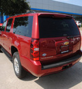 chevrolet suburban 2013 red suv ls 1500 flex fuel v8 2 wheel drive automatic 75075