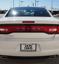 dodge charger 2011 white sedan gasoline 6 cylinders rear wheel drive automatic 76011