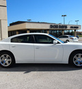 dodge charger 2011 white sedan gasoline 6 cylinders rear wheel drive automatic 76011