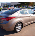 hyundai elantra 2013 gold sedan gls gasoline 4 cylinders front wheel drive 6 speed manual 77074