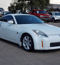 nissan 350z 2003 white coupe gasoline 6 cylinders rear wheel drive 6 speed manual 77074
