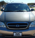 kia sedona 2005 dk  green van ex gasoline 6 cylinders front wheel drive automatic with overdrive 76018