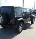 jeep wrangler unlimited 2010 green suv rubicon gasoline 6 cylinders 4 wheel drive automatic 75007