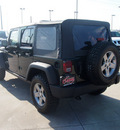 jeep wrangler unlimited 2010 green suv rubicon gasoline 6 cylinders 4 wheel drive automatic 75007