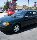 mazda protege 2000 green sedan es 4 cylinders 5 speed with overdrive 92882