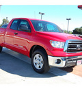 toyota tundra 2011 red grade 8 cylinders automatic with overdrive 77706