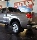 toyota tundra 2011 green grade 8 cylinders automatic 75062