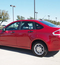ford focus 2011 dk  red sedan se gasoline 4 cylinders front wheel drive automatic with overdrive 76018