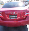 toyota camry 2009 red sedan le gasoline 4 cylinders front wheel drive automatic 32401