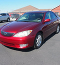 toyota camry 2006 red sedan xle gasoline 6 cylinders front wheel drive automatic 76234