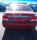 toyota camry 2006 red sedan xle gasoline 6 cylinders front wheel drive automatic 76234