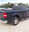 ford f 150 2005 blue xlt 8 cylinders automatic 77575