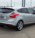 ford focus 2012 silver hatchback titanium flex fuel 4 cylinders front wheel drive automatic with overdrive 77074
