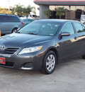 toyota camry 2011 gray sedan le 4 cylinders automatic with overdrive 77074