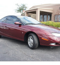 saturn s series 2002 red coupe sc2 gasoline 4 cylinders front wheel drive automatic 76543