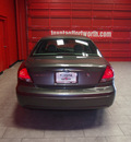 ford taurus 2004 green sedan sel gasoline v6 24v front wheel drive automatic with overdrive 76116