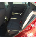 chevrolet sonic 2013 red sedan 4 cylinders 6 spd auto mylink touch lpo,cargo net 77090