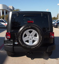 jeep wrangler unlimited 2011 black suv sport gasoline 6 cylinders 4 wheel drive automatic 75093
