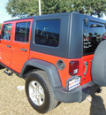 jeep wrangler unlimited 2007 red suv rubicon gasoline 6 cylinders 4 wheel drive automatic 34474