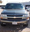 chevrolet tahoe 2002 dk  gray suv lt flex fuel 8 cylinders rear wheel drive automatic with overdrive 77074