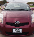 toyota yaris 2009 red hatchback gasoline 4 cylinders front wheel drive automatic 76018