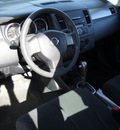 nissan versa 2011 gray sedan gasoline 4 cylinders front wheel drive automatic 79925