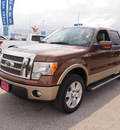 ford f 150 2011 brown lariat flex fuel 8 cylinders 4 wheel drive automatic 77375