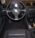 volkswagen jetta 2006 black sedan tdi diesel 4 cylinders front wheel drive automatic 76116