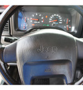 jeep wrangler 2003 green suv se gasoline 4 cylinders 4 wheel drive 6 speed manual 76543