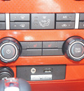 ford f 150 2010 orange svt raptor gasoline 8 cylinders 4 wheel drive automatic 75080