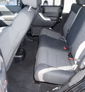 jeep wrangler unlimited 2011 black clear coat suv sahara gasoline 6 cylinders 4 wheel drive manual 75080