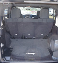 jeep wrangler unlimited 2011 black clear coat suv sahara gasoline 6 cylinders 4 wheel drive manual 75080