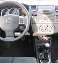 nissan versa 2009 gray hatchback gasoline 4 cylinders front wheel drive manual 33884