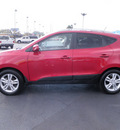 hyundai tucson 2011 dk  red gls gasoline 4 cylinders front wheel drive automatic 32401
