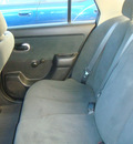 nissan versa 2011 blue sedan gasoline 4 cylinders front wheel drive standard 79936