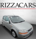 chevrolet aveo 2004 silver hatchback ls gasoline 4 cylinders front wheel drive automatic with overdrive 60546