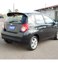 chevrolet aveo 2009 black hatchback aveo5 lt gasoline 4 cylinders front wheel drive automatic with overdrive 77632