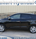 hyundai tucson 2010 black suv limited gasoline 4 cylinders front wheel drive 6 speed automatic 76210