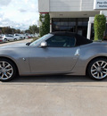 nissan 370z 2010 lt  gray coupe roadster touring gasoline 6 cylinders rear wheel drive shiftable automatic 77477