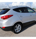 hyundai tucson 2010 silver suv limited gasoline 4 cylinders front wheel drive automatic 77539