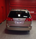 toyota sienna 2009 tan van le 7 passenger gasoline 6 cylinders front wheel drive automatic 76116