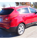 hyundai tucson 2013 dk  red gls gasoline 4 cylinders front wheel drive automatic 77074