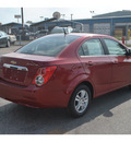 chevrolet sonic 2013 red sedan lt gasoline 4 cylinders front wheel drive automatic 78521