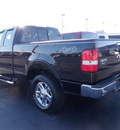 ford f 150 2006 black lariat gasoline 8 cylinders 4 wheel drive automatic with overdrive 32401
