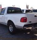 ford f 150 2001 beige xlt 8 cylinders automatic with overdrive 77020