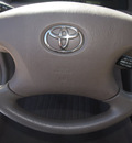 toyota camry 2004 tan sedan le 4 cylinders automatic with overdrive 76108