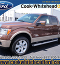 ford f 150 2012 brown lariat gasoline 6 cylinders 4 wheel drive automatic 32401