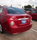 chevrolet sonic 2013 red sedan lt gasoline 4 cylinders front wheel drive not specified 77090