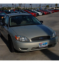 ford taurus 2007 gold sedan se gasoline 6 cylinders front wheel drive 4 speed automatic 77090